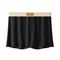 Pack of men's solid colour ice silk boxer shorts showing loose fit and mid-waist design.