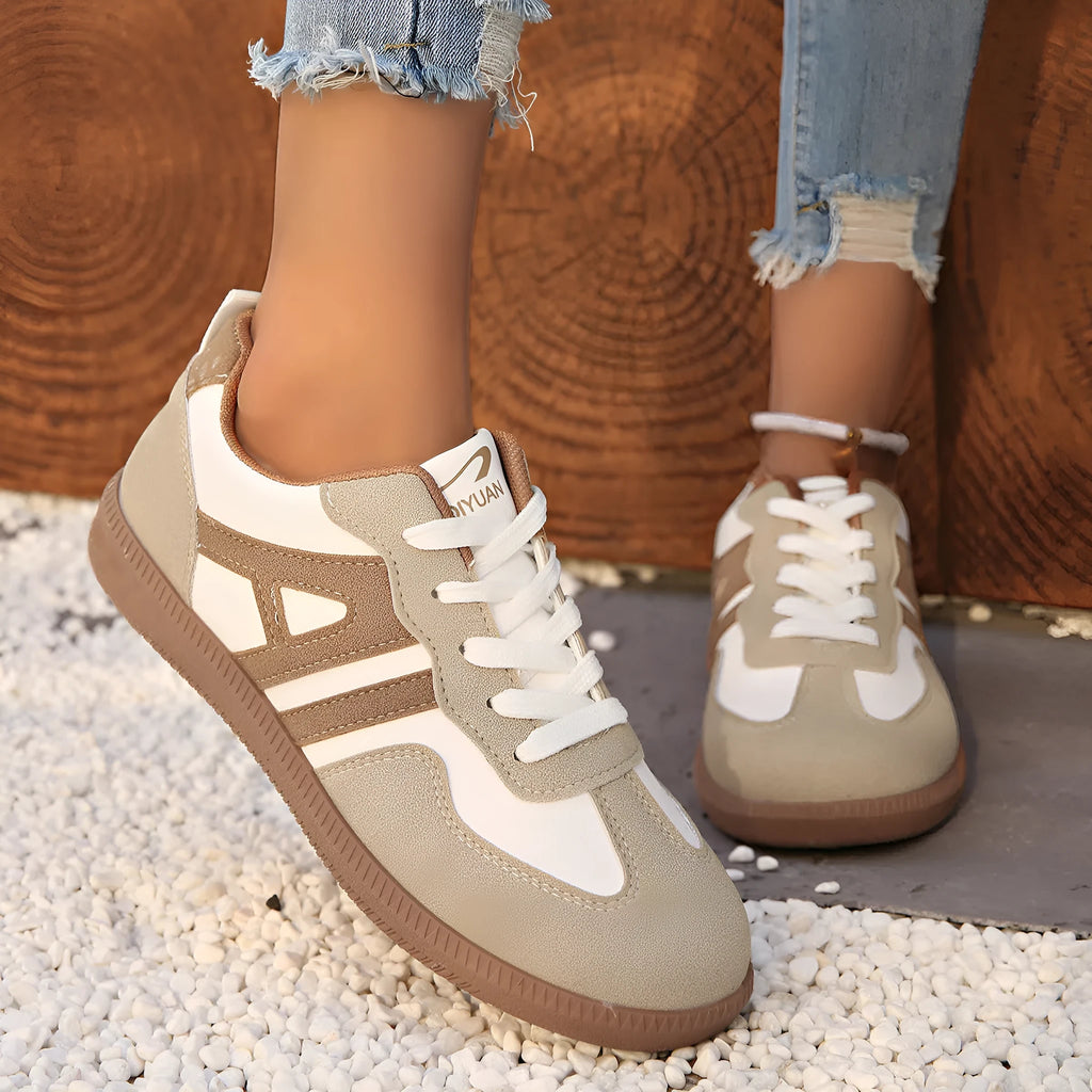Women's retro colour matching lace-up jogging shoes in grey with a round toe and platform sole.