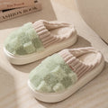 Women's plaid pattern plush indoor slippers with coral velvet upper and anti-slip sole in coffee colour.