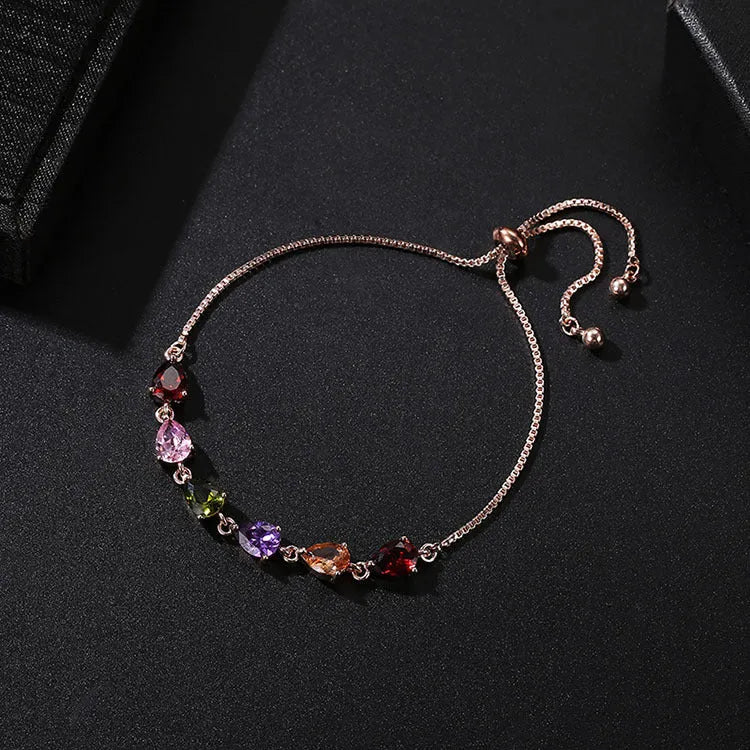 Copper geometric bracelet with inlaid zircon and glass stones for women in water drop diamond shape