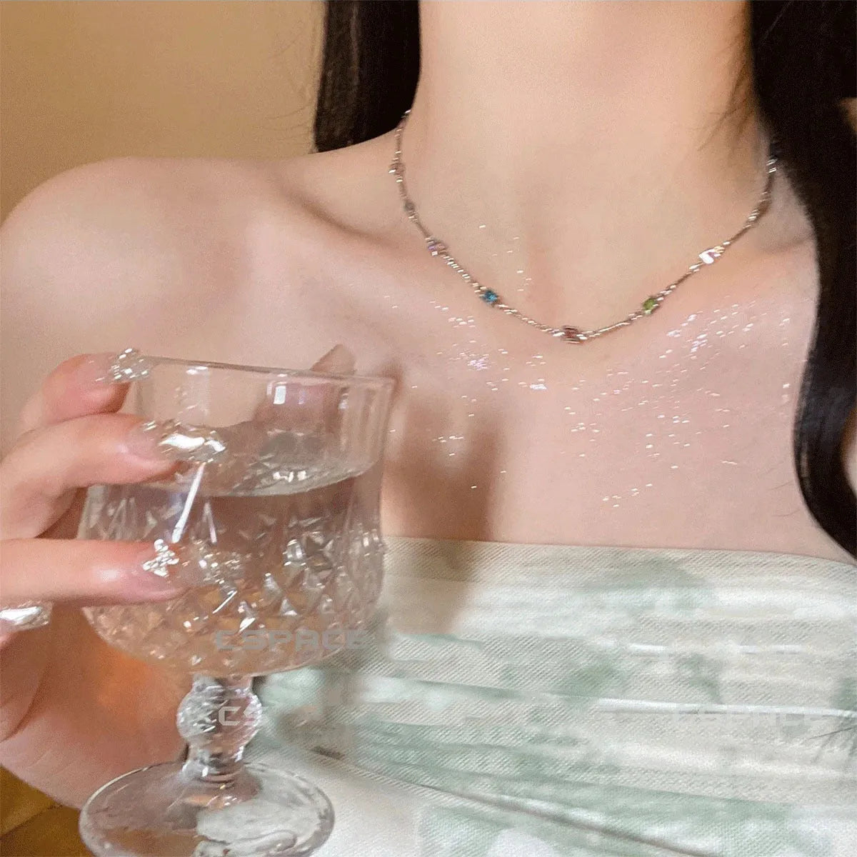 Fine geometric clavicle chain necklace with square artificial crystal links in gold or white K plating.