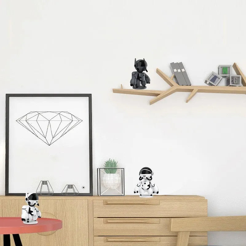 White or black Space Robot home monitoring camera with a wide-angle lens on a detachable base.