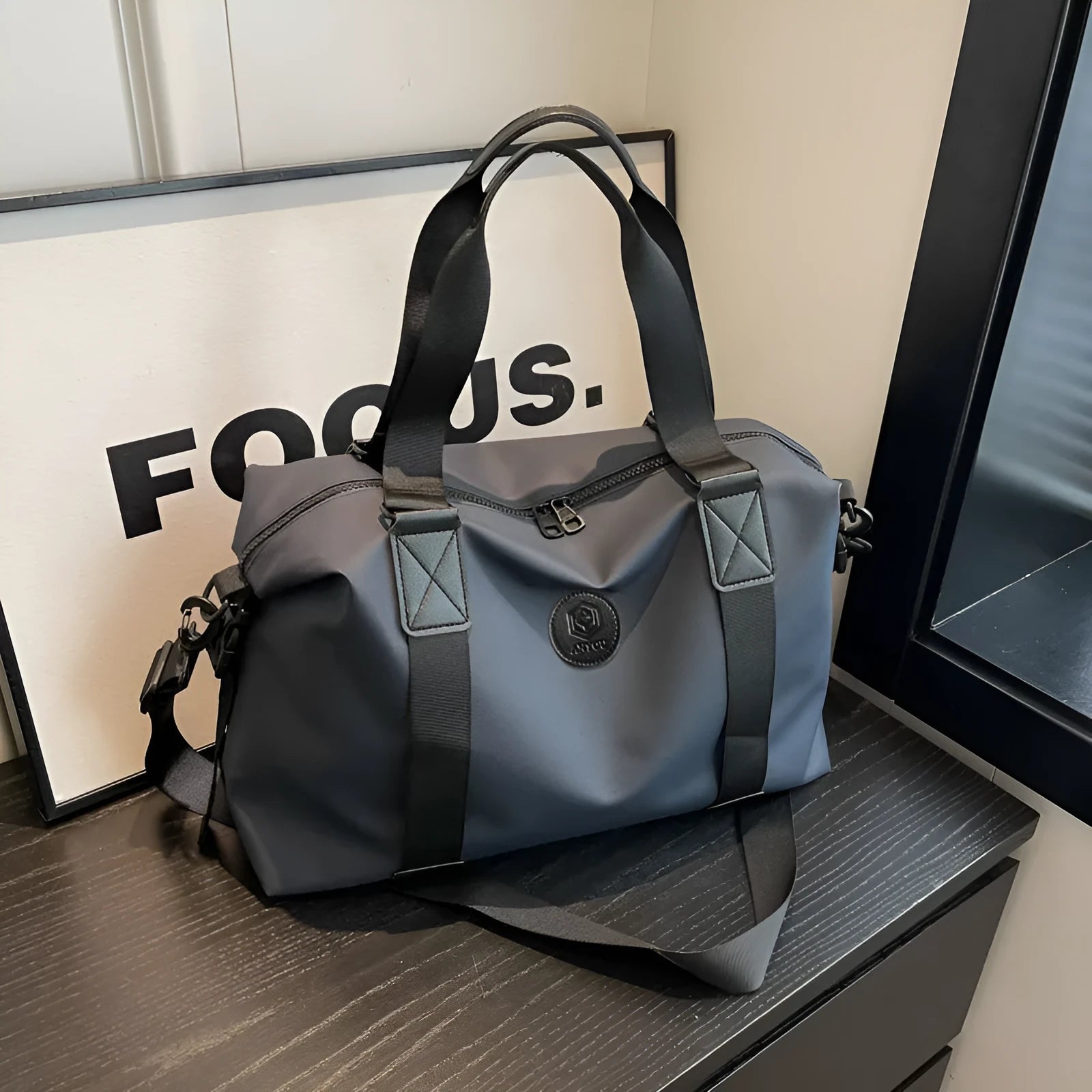 Large black waterproof Oxford cloth travel bag with dry-wet separation compartments.
