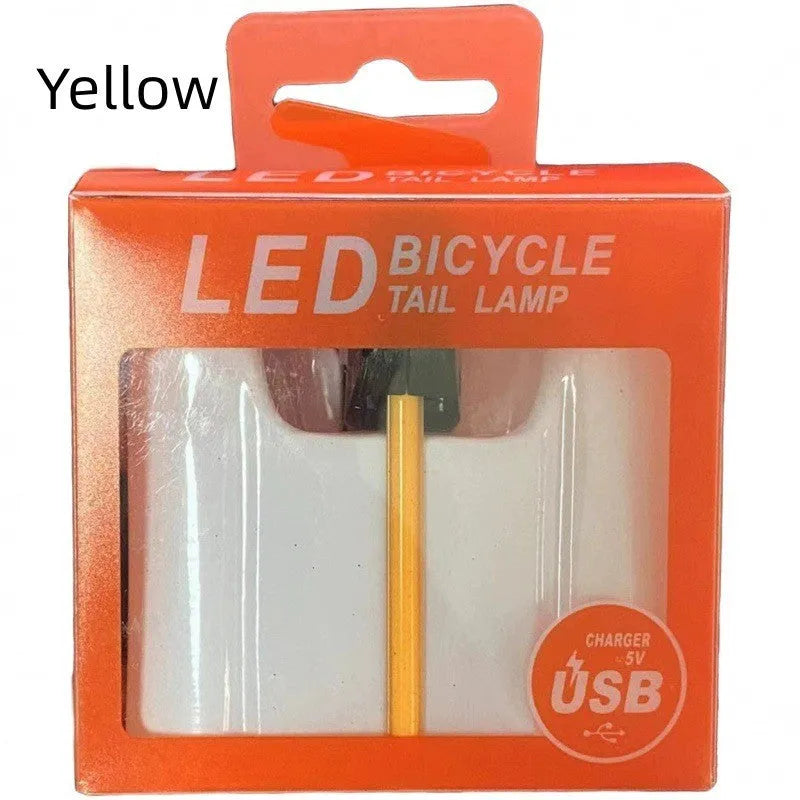 USB-charging waterproof bicycle rear taillight in blue, pink, red, white, or yellow colour options