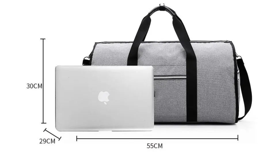 Medium sized cylindrical travel bag in black, made from oxford cloth with a top zipper.