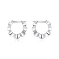 Sterling silver geometric earrings with round details and electroplated silver finish