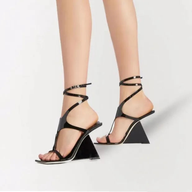 Women's black microfiber high heel sandals with a square toe and button fastening on a 9.5cm rubber heel.