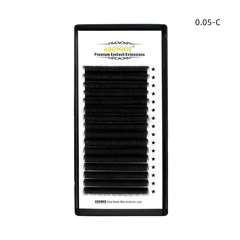 Dense 16-row false eyelashes made from mink hair in a matte round wool style on a clear strip.