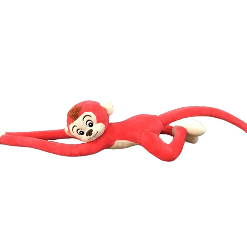 Long arm hanging monkey plush toy in pink, 70cm height, curled around a curtain rod for home decoration