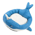 Blue duck-shaped fluffy pet bed sofa for small dogs and cats on a floor.