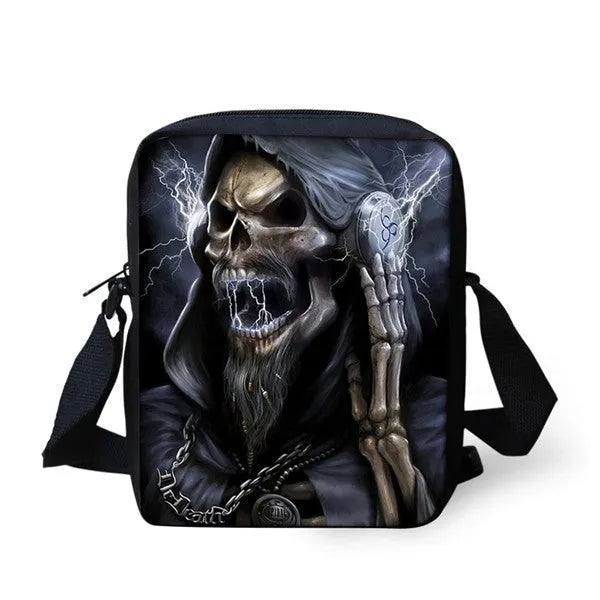 Children's skull print polyester messenger bag with shoulder straps, shown in a medium size.