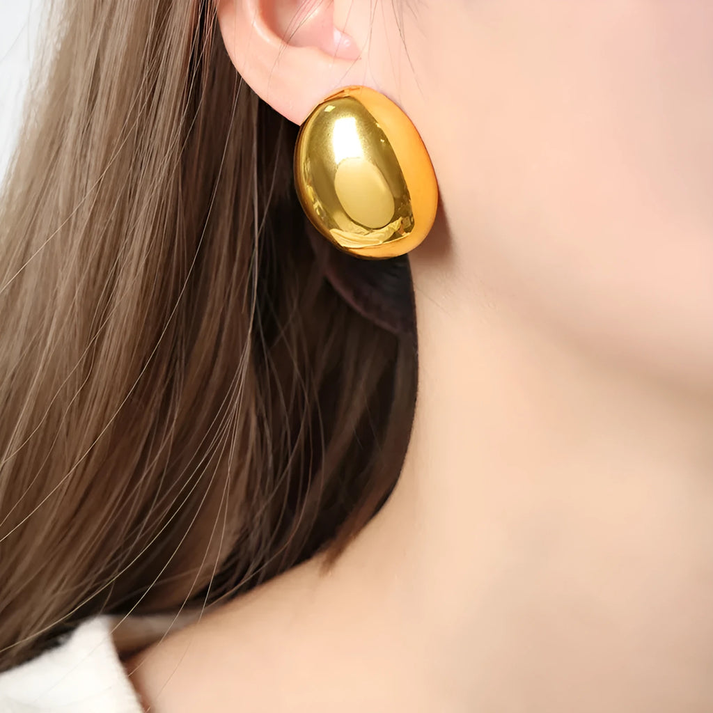 Geometric stainless steel ear studs with 18k gold plating and glazed surface in DFE139 colour
