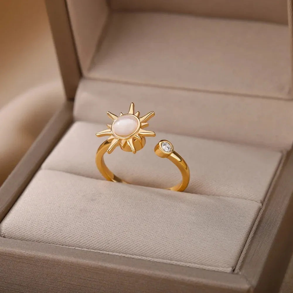 Simple geometric rotatable decompression ring with adjustable opening in gold electroplated finish