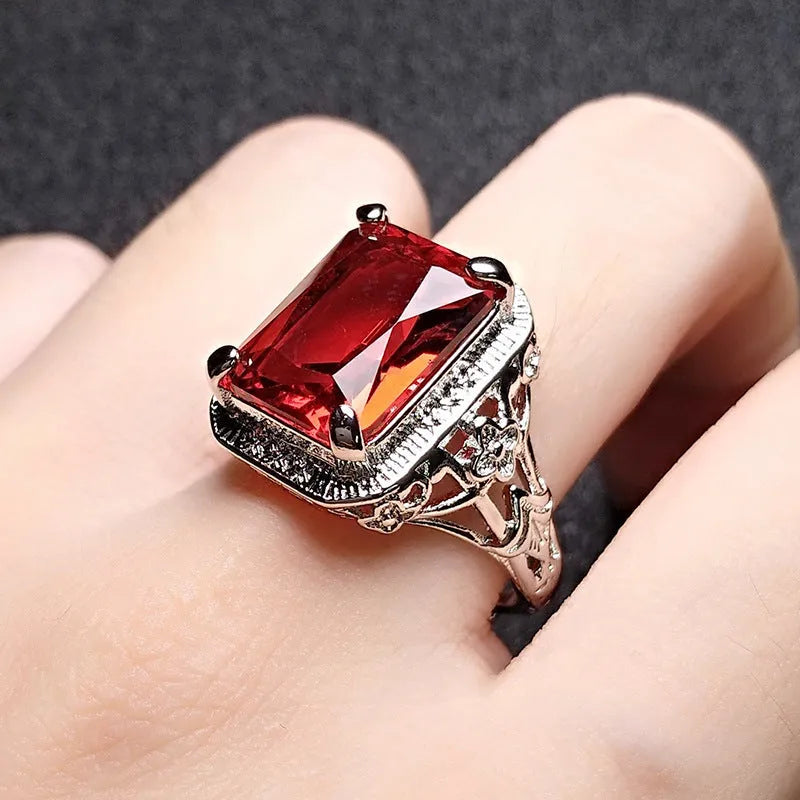 Geometric copper women's ring with pigeons-blood ruby gemstone and platinum colour electroplating