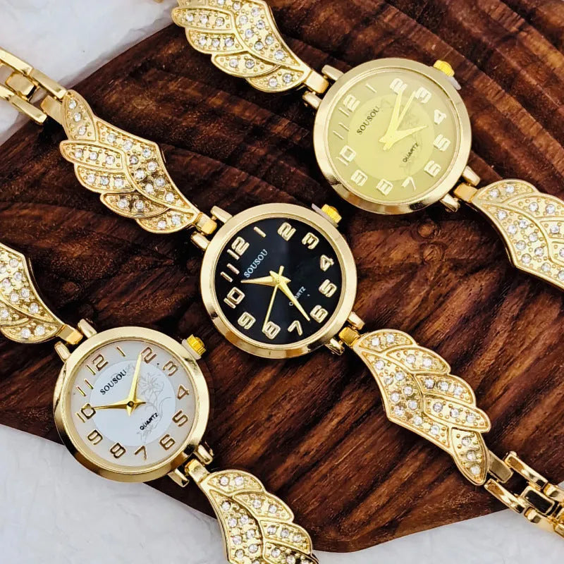 Women's stainless steel watch with round gold surface dial and vachette clasp