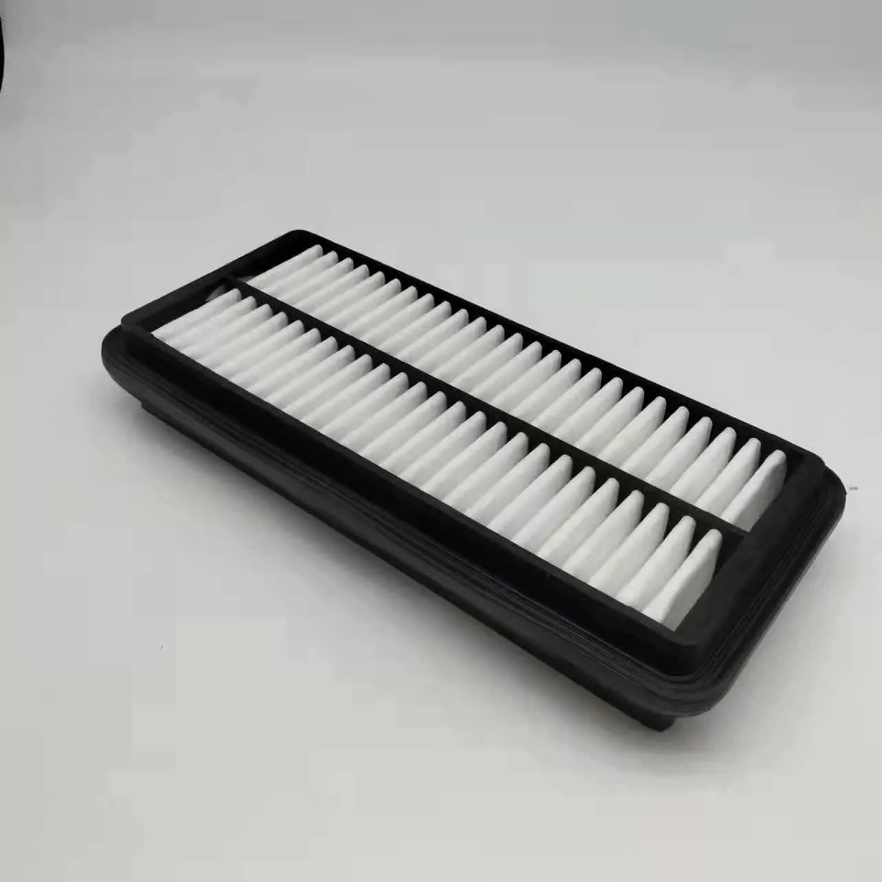 Black rectangular car air filter for Hyundai vehicles measuring 256mm by 113mm by 40mm