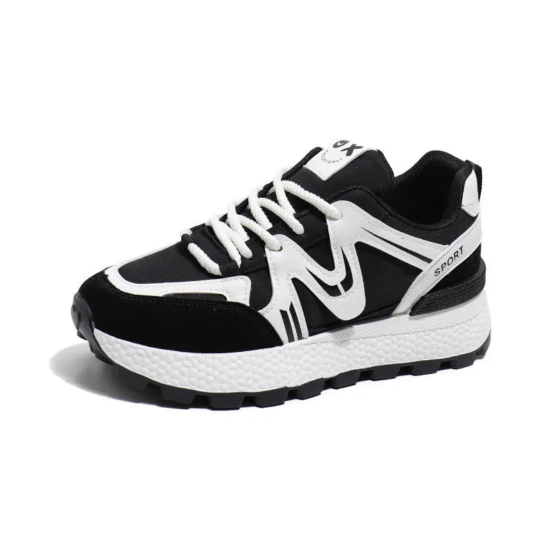 Women's black platform casual shoes with flat heel, round toe, and lace-up front on a white background.