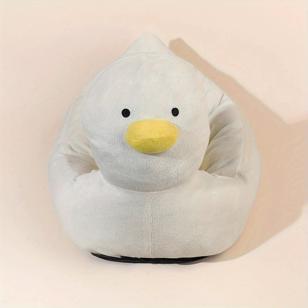 Blue duck-shaped fluffy pet bed sofa for small dogs and cats on a floor.