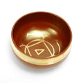 Seven colourful handmade Himalayan-style bowl percussion instruments arranged by size and colour