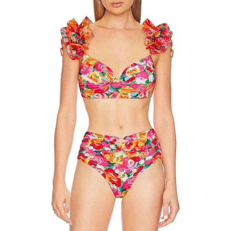Women's floral print swimsuit with high waist bottom and push up bikini top in blue floral pattern