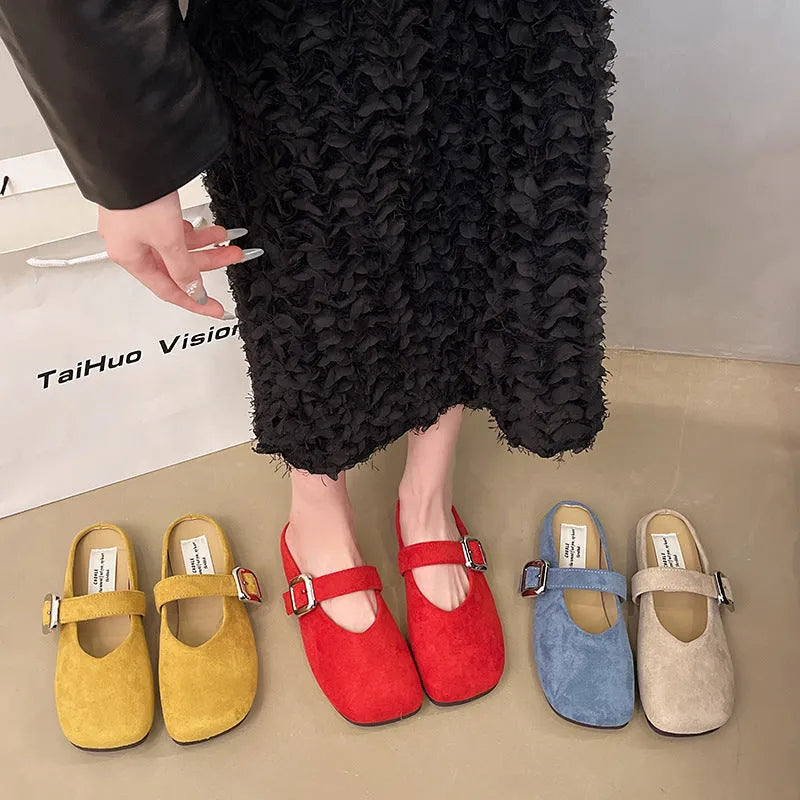 Women's flat closed toe slippers in apricot colour with square head and rubber sole.