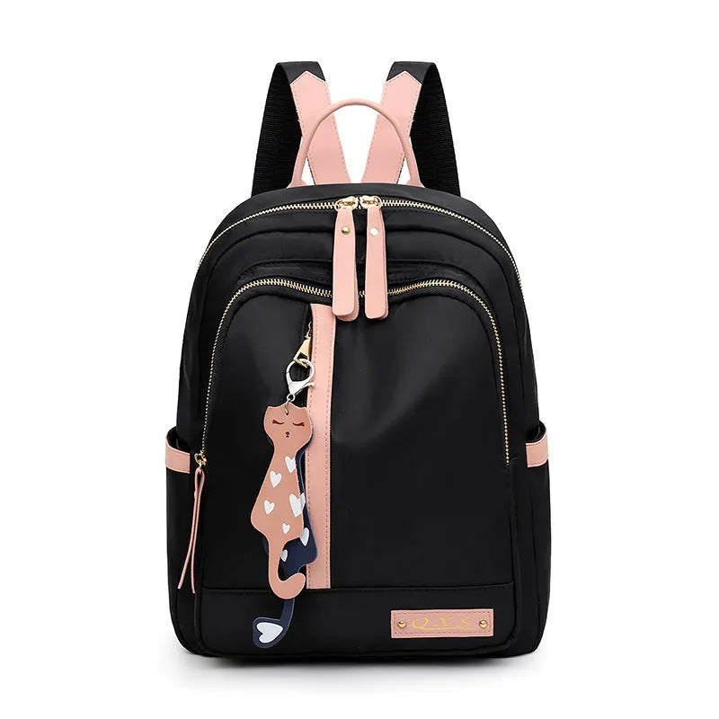 Women's black nylon casual backpack with double shoulder straps and external pockets