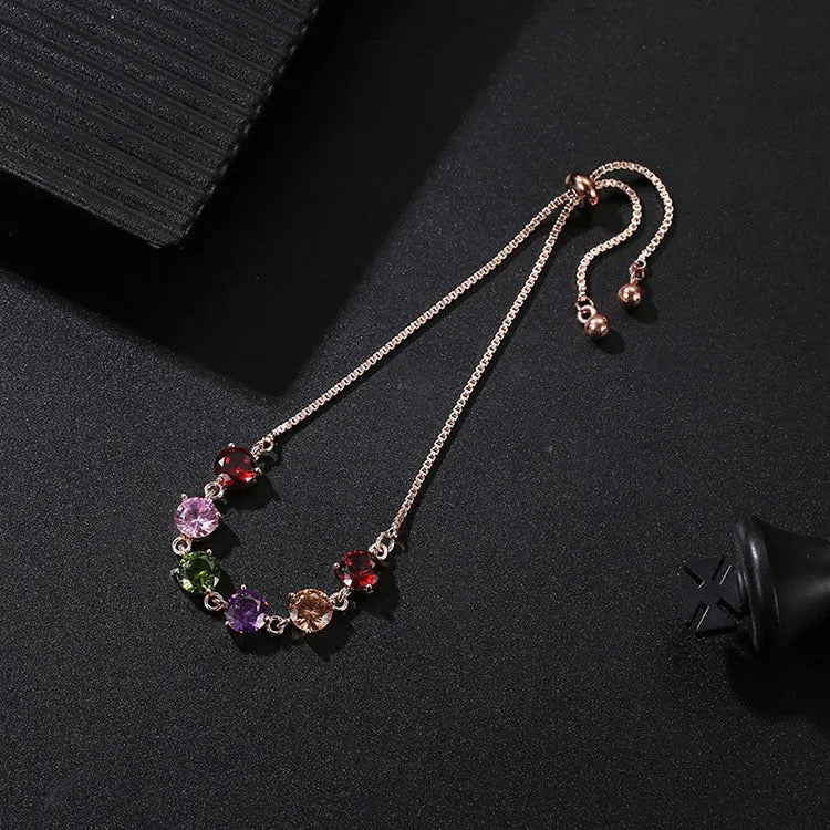 Copper geometric bracelet with inlaid zircon and glass stones for women in water drop diamond shape
