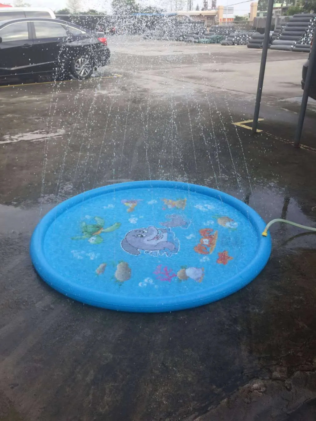 Blue PVC water spray play mat with marine animal graphics for outdoor children's water play