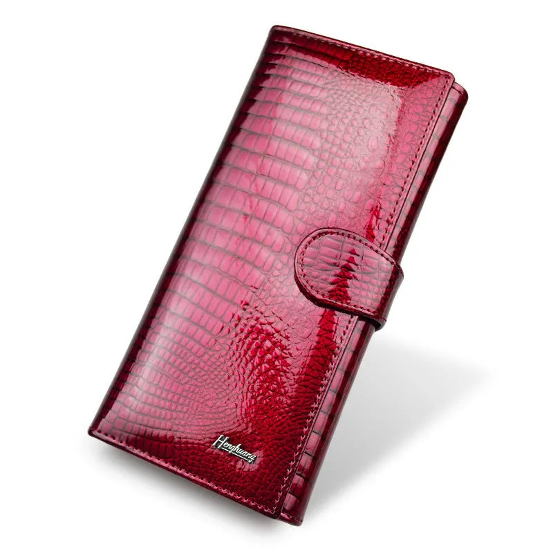 Crocodile pattern leather coin purse in wine red, black, or red colours.