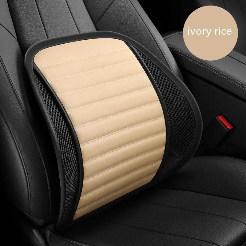 Leather lumbar support cushion with removable memory foam pad in sapphire blue colour on a car seat.