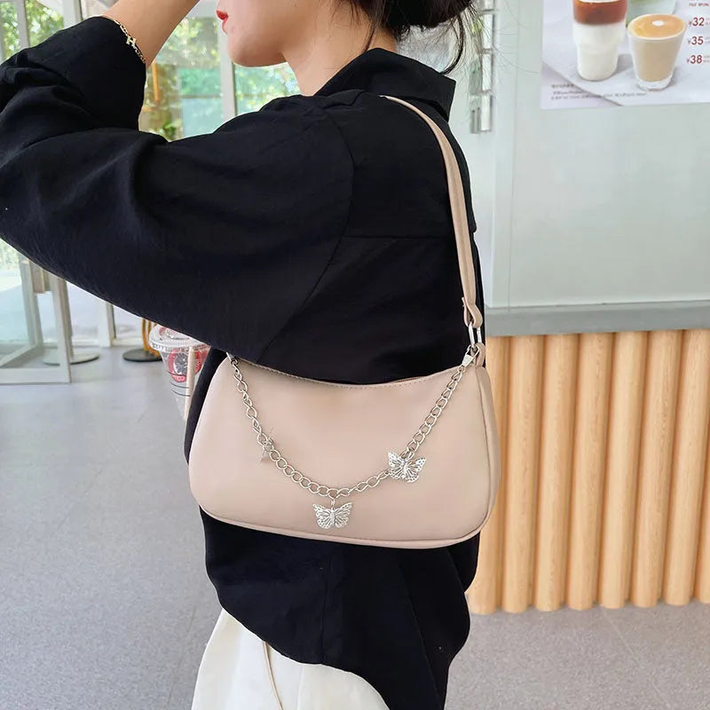 Women's retro style butterfly chain underarm bag in synthetic leather with crossbody strap