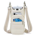 Cloth water bottle bag mounted on bicycle handlebars in beige colour