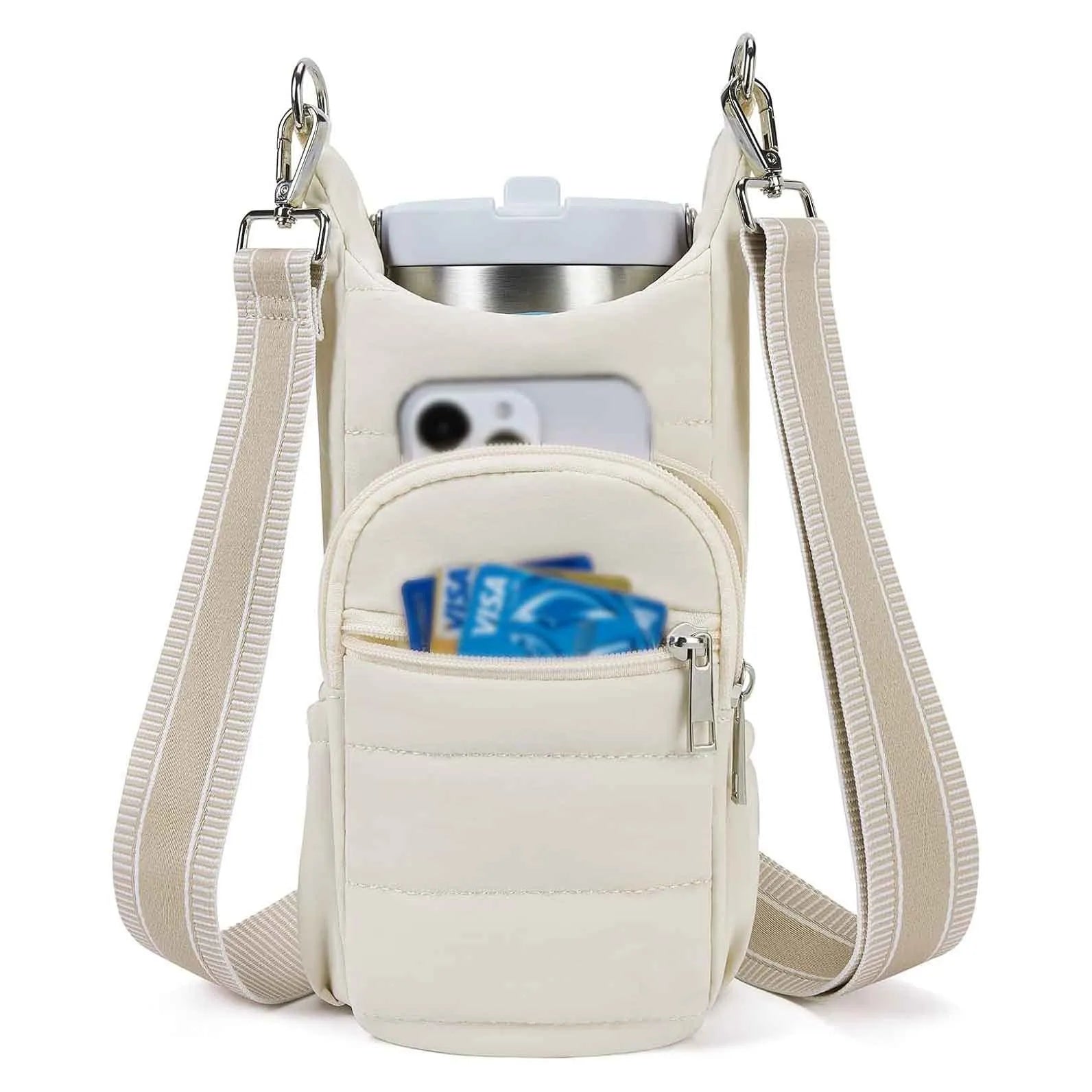 Cloth water bottle bag mounted on bicycle handlebars in beige colour