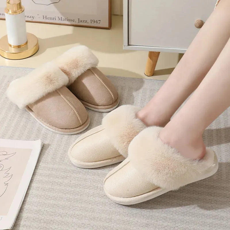 Women's brown plush indoor slippers with round toe, flat heel, and non-slip sole.