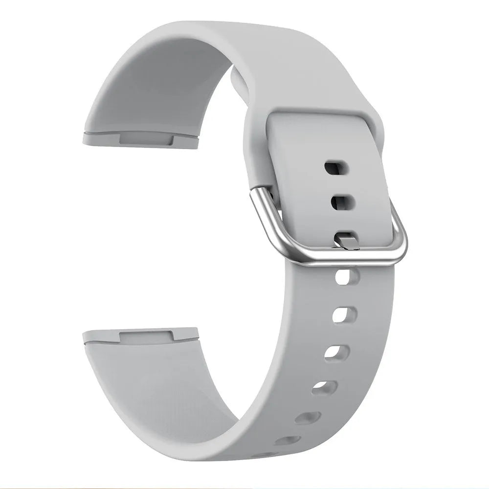 Solid colour silicone replacement strap with silver buckle for Fitbit Versa 3 and Sense 2 smartwatches.