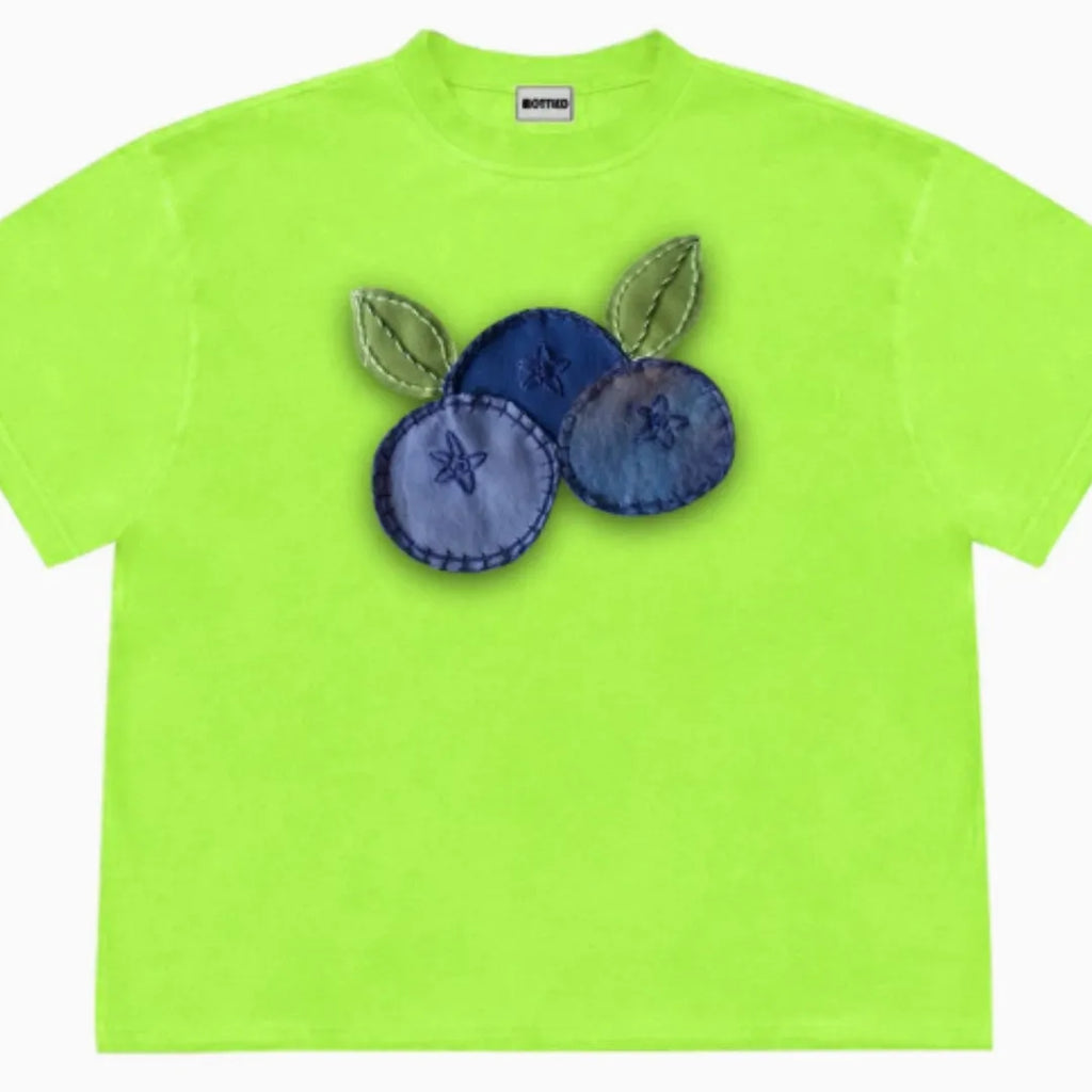Loose fit blueberry fruit patchwork print short sleeve T-shirt on a hanger