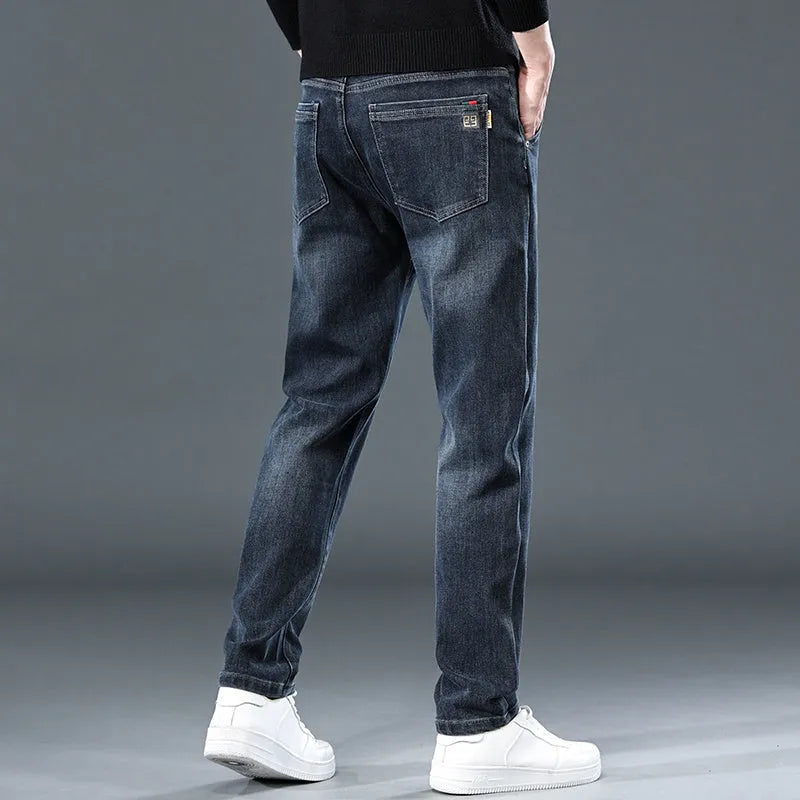 Blue grey slim straight casual men's trousers with a loose fit and mid waist.