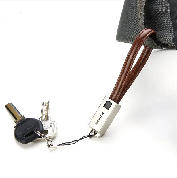 Leather and zinc alloy Lightning charging cable in red colour showing 20cm length with Lightning connector