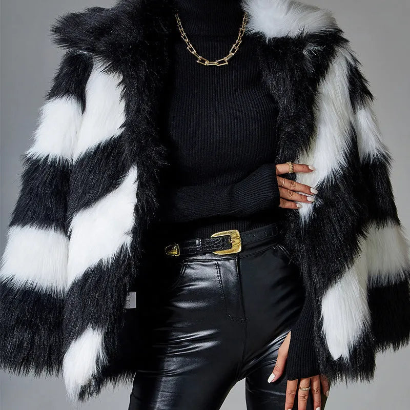 Women's lapel contrast colour faux fur coat with a detachable fur collar on a hanger