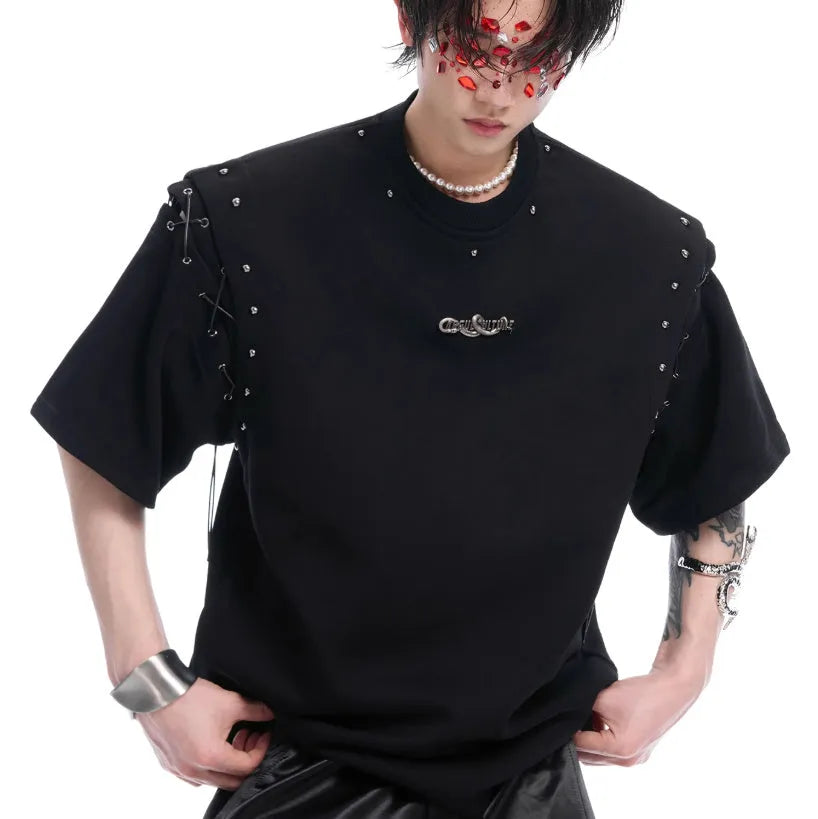 Women's black deconstruction short sleeve t-shirt with a white lace-up detail and front cutout.