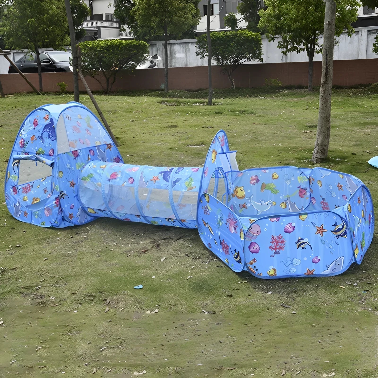 Three-piece children's play tent centre with integrated ball pool and tunnel in colourful cartoon design