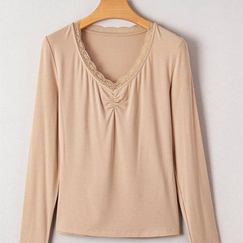 Women's solid colour long sleeve casual top with lace trim detail in slim fit design