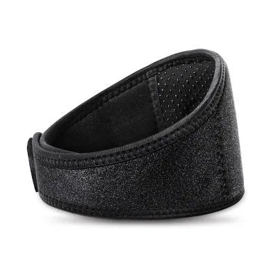 Black self-heating magnetic therapy neck guard with adjustable shoulder strap laid flat.