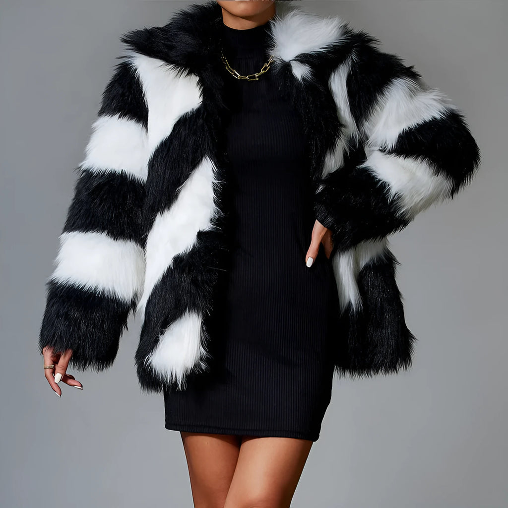 Women's lapel contrast colour faux fur coat with a detachable fur collar on a hanger