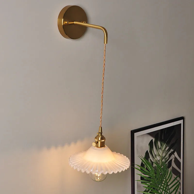 Retro brass lotus wall lamp with glass shade in various colour options