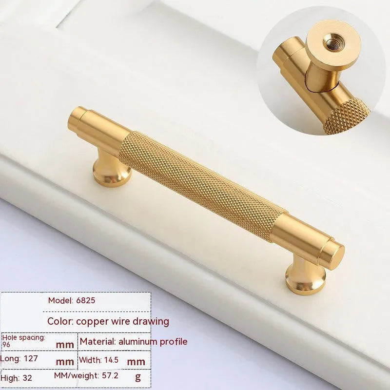 Brushed brass aluminium alloy cabinet handle with visible screw holes for mounting.