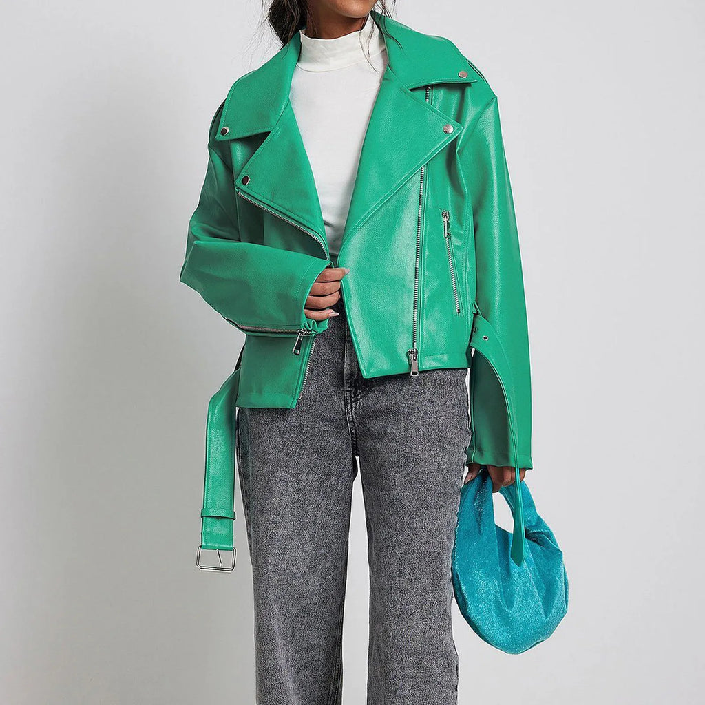 Black punk style leather jacket with a Peter Pan collar and regular sleeves on a hanger.