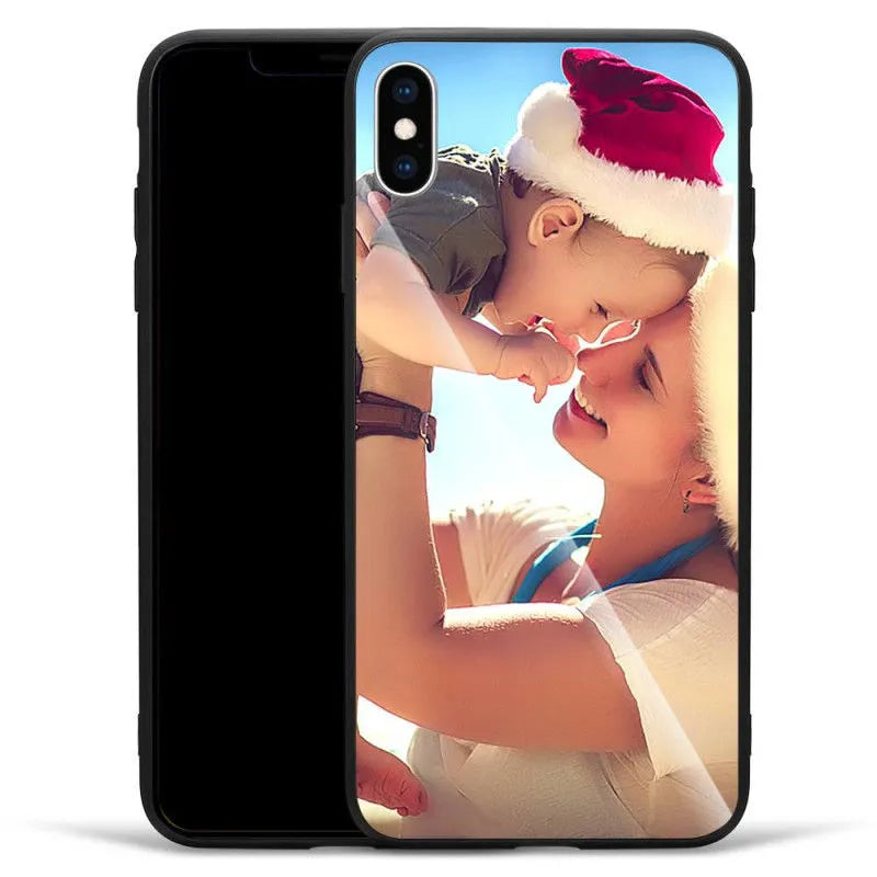 Patterned iPhone case with raised edges on a table next to an iPhone.
