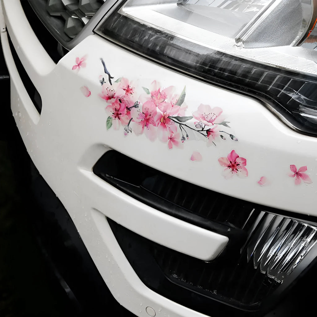 Two sizes of pink cherry blossom flower car sticker on a white background.