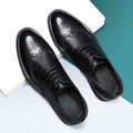 Men's black and brown brogue leather business shoes with traditional perforated decoration
